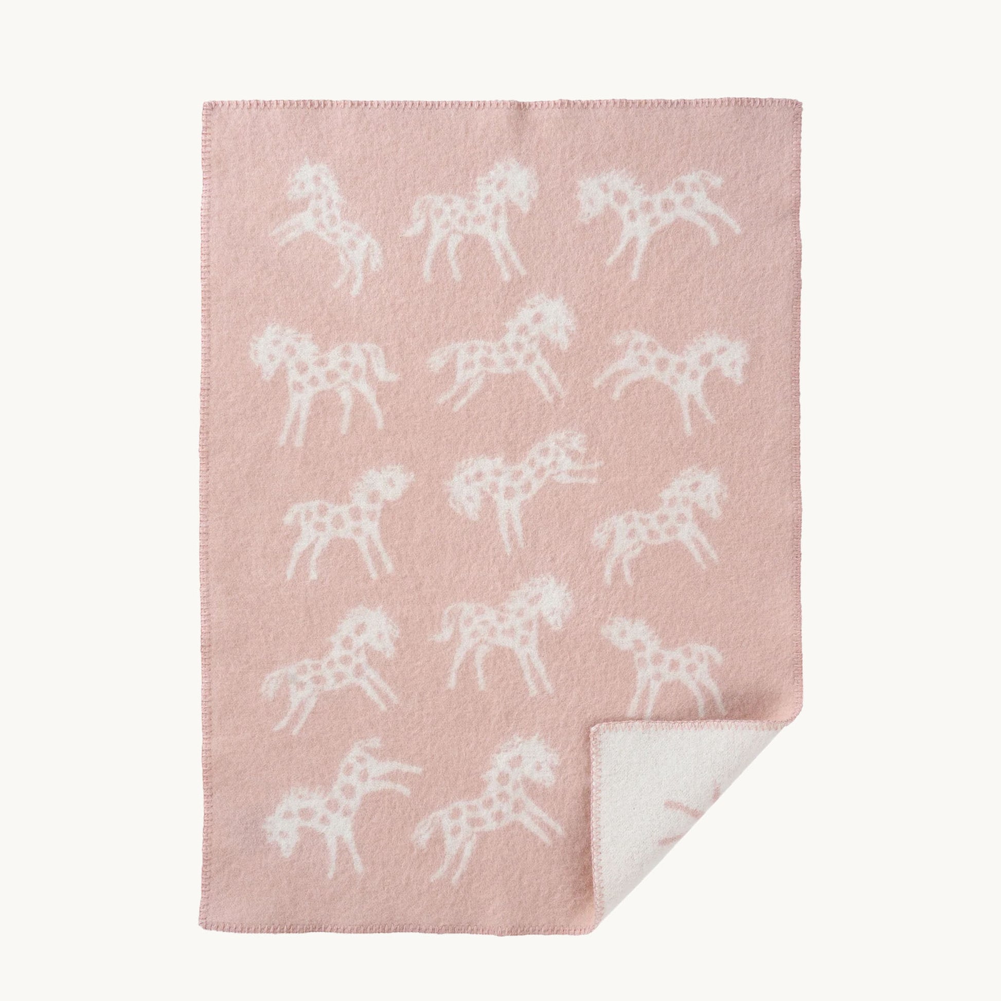 Klippan babyplaid i uld med ponyer i rosa farve